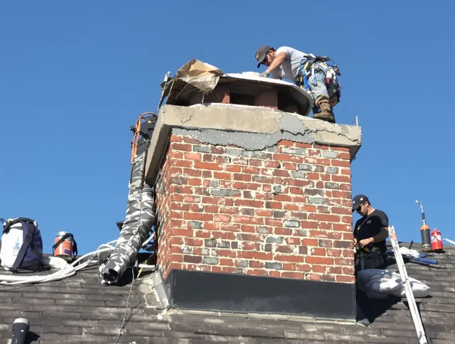 Westchester Chimney Sweep installing a custom chimney crown in Westchester, FL