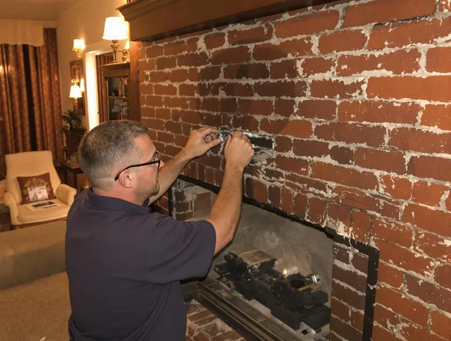 Westchester Chimney Sweep expert fixing a fireplace in Westchester, FL